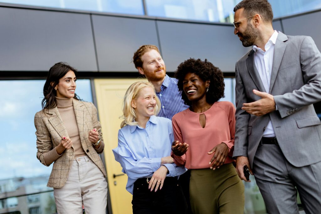 Casual Networking Event at Office, Professionals Mingling in Modern Glass Building